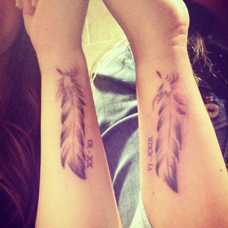feather tattoo designs for wrist
