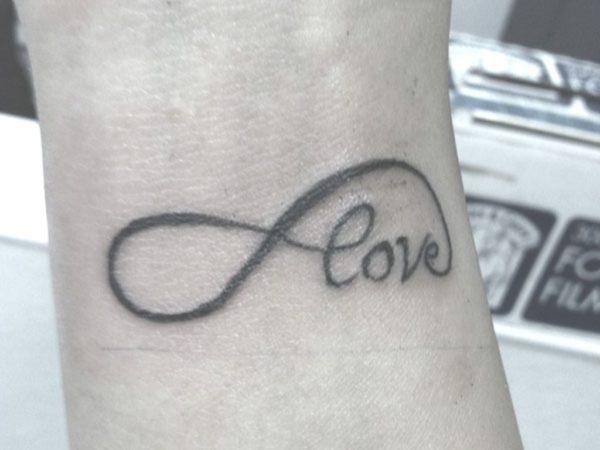 61 Impressive Infinity Wrist Tattoos - Wrist Tattoo Pictures