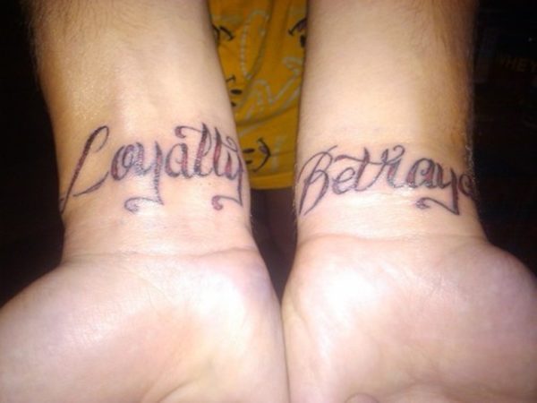 Loyalty Betrayal Tattoo On Wrist