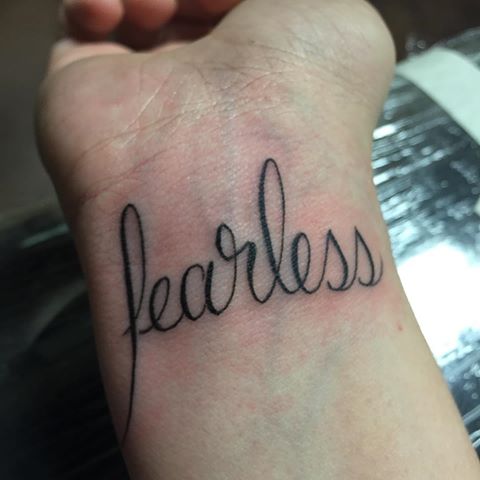 Stunning Fearless Wrist Tattoo